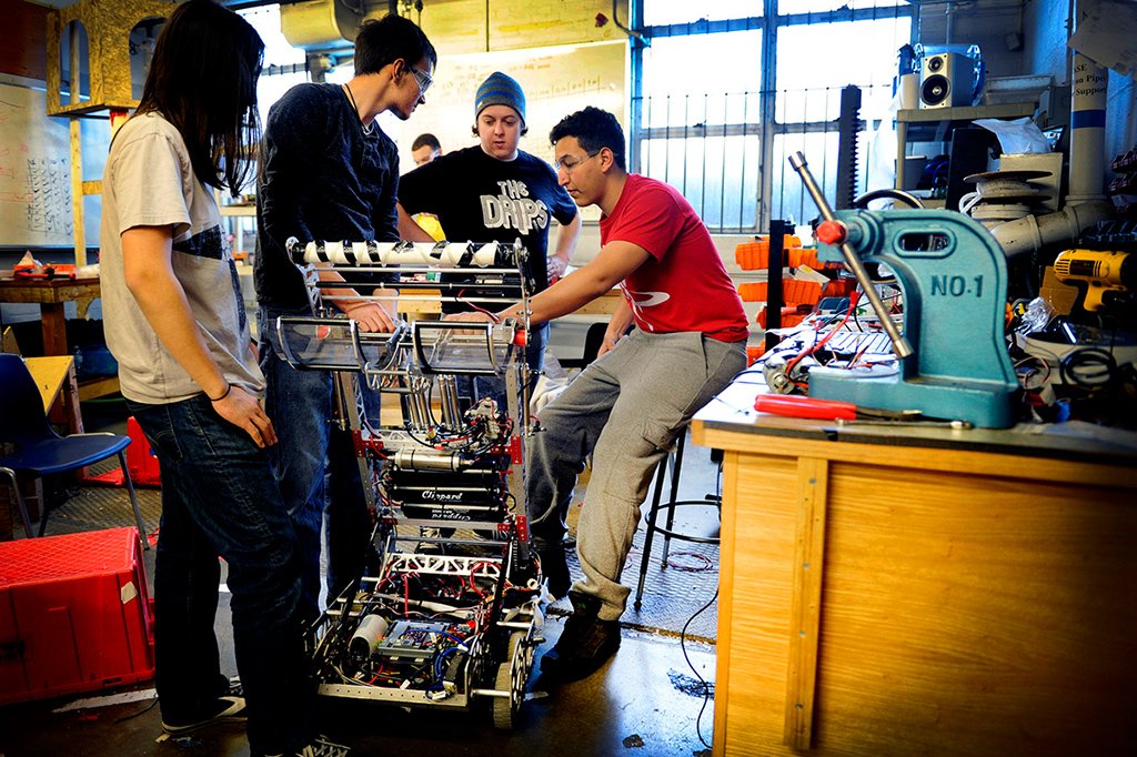 Helping Hand - Alumnus <a href="/brandonholley/">Brandon Holley</a> works with The NUTRONS First Robotics Team 125 on Tuesday 📷 <a href="/modoonophoto/">Matthew Modoono</a>