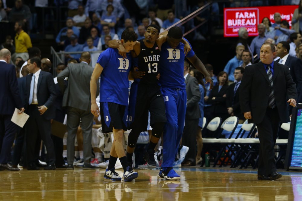 dukebasketball's tweet photo. Duke played most of the game without junior Matt Jones, who injured his left ankle: https://t.co/81wUnxS56t https://t.co/QzpCEJubxR