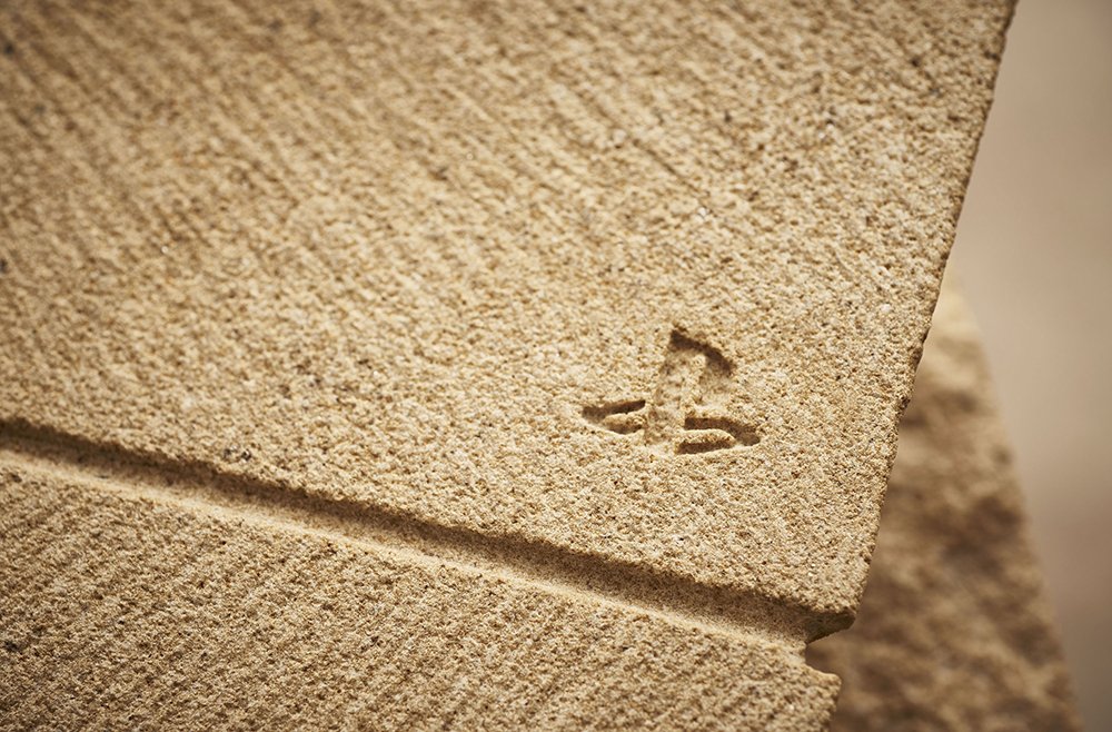 PlayStationUK's tweet photo. Far Cry Primal is almost here and @UbisoftUK went full Flintstones and carved a PS4 out of stone! #PS4Rocks https://t.co/YmiNoO5dbt