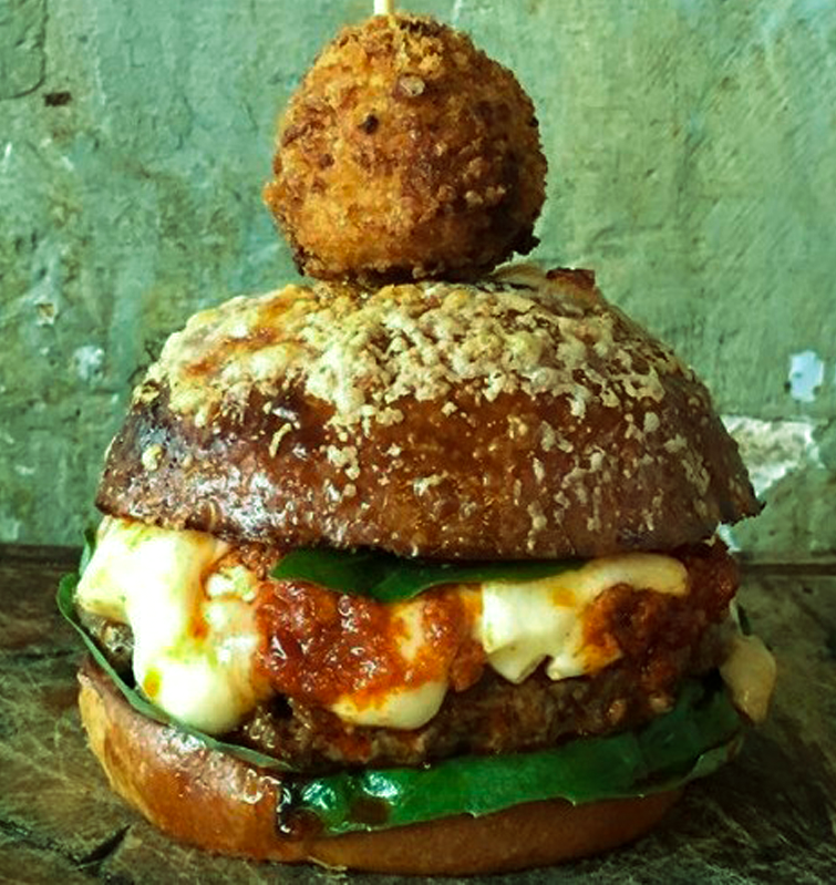 TheTrueView's tweet photo. #DateFun | Foodie lovers behold, the @pizzapilgrims x @TheBluesKitchen pizza-burger is here! https://t.co/gQ4j0olxqM https://t.co/njvdz6yTTY