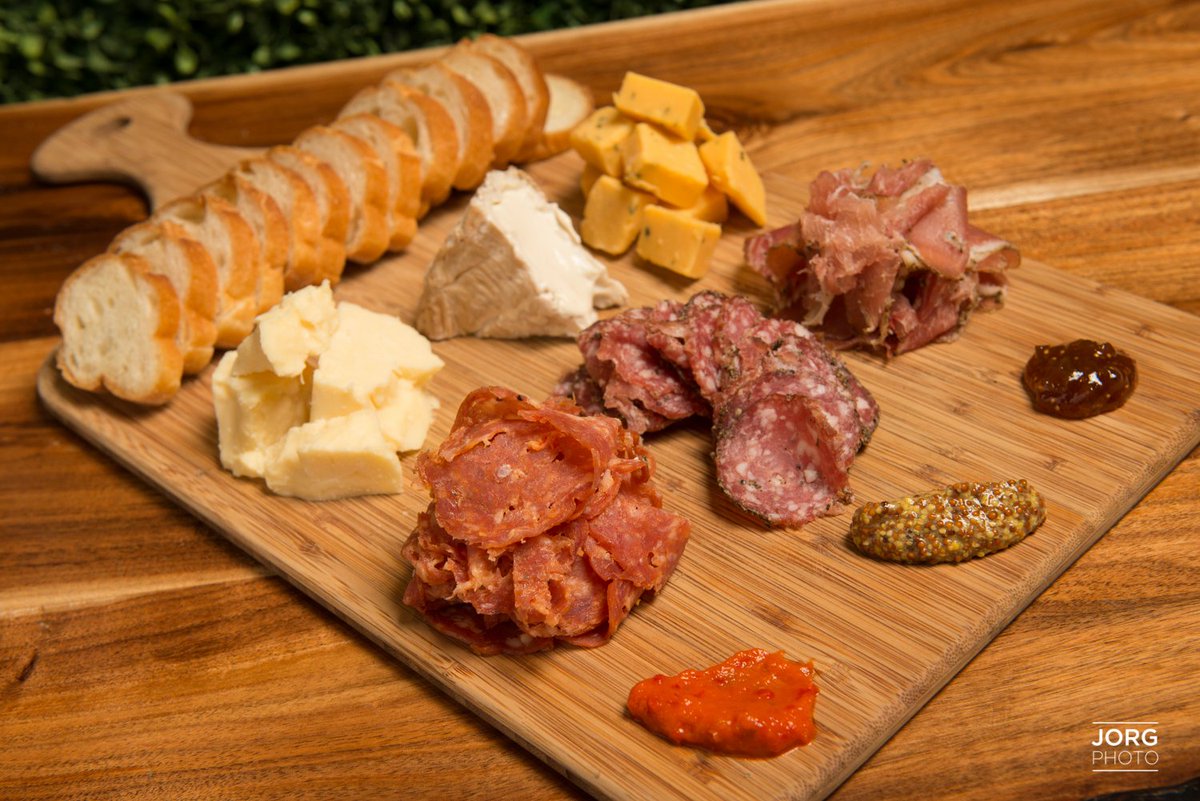 Stop in for happy hour today from 4-7pm and grab one of our seasonal charcuterie boards!