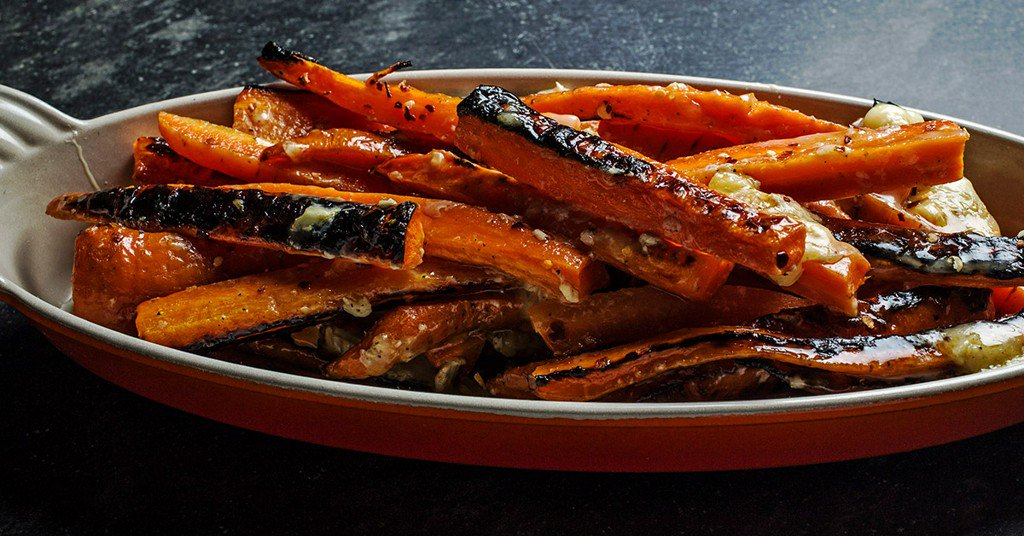 TastingTable's tweet image. Spicy burnt carrots with honey and Brie will be the char of the show: bit.ly/1PUXv9z