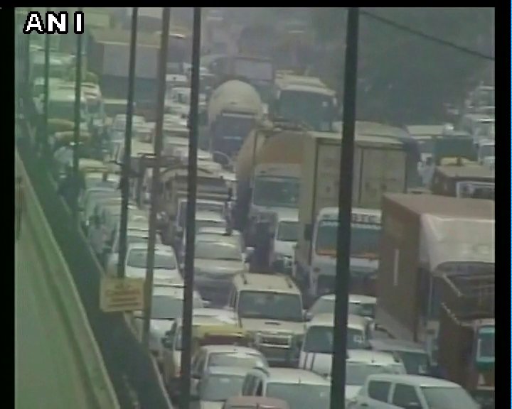 ANI's tweet photo. Gurgaon: Traffic jam caused due to protest by Jats over reservation row on Sohna Road https://t.co/uvqfZ0Omp9