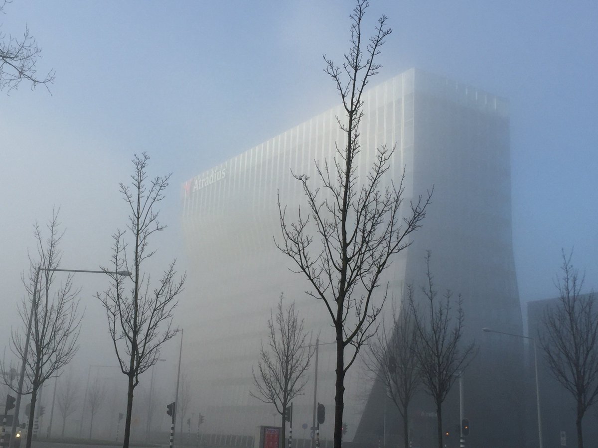 atradius's tweet photo. Our Headquarters this morning got caught in the fog in #Amsterdam! #InsideAtradius https://t.co/9NUT2YjL5J