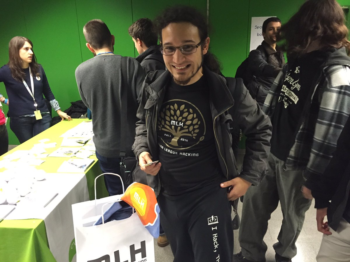 MLHacks's tweet photo. Check out @kaitokidi who's sporting both the Fall 2015 and now the equally as cool Spring 2016 shirt! #HackUPC https://t.co/cmHOP7IIOh