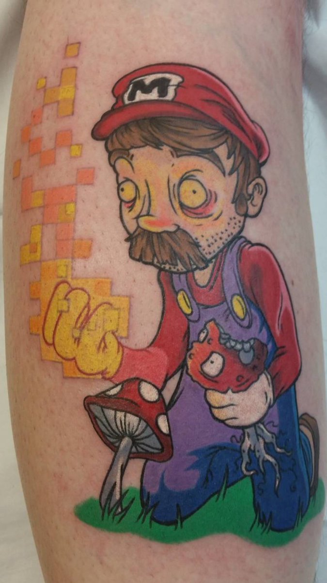 Ok, we found the best gamer tattoo ever! Done by John White at Bruce Bart  Tattooing in Fort Lauderdale., image size:675x1200