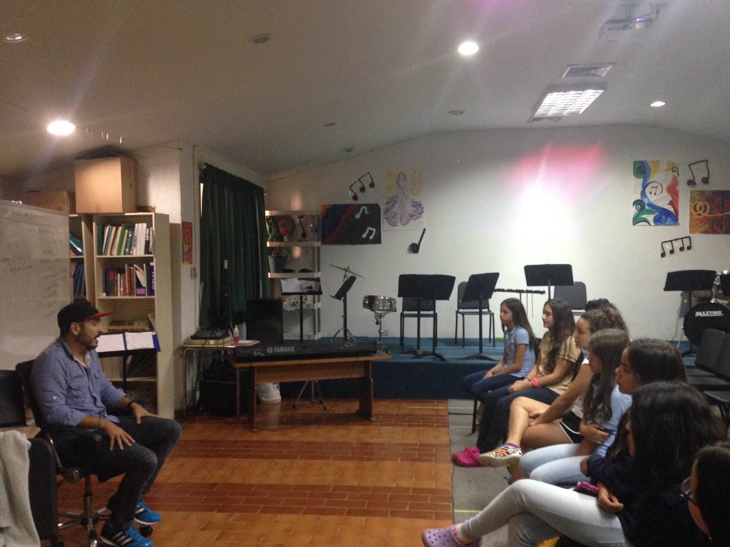 KatieJubert's tweet photo. The kids are spellbound listening to Avelino Romero talk about music as a career. Thanks @erine75 for #careerday https://t.co/x1deEHhbVO