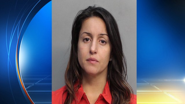 Mom arrested after daughter rescued from burning Miami-Dade home bit.ly/1PLyvnw?utm_me… https://t.co/2ORm19HxQd