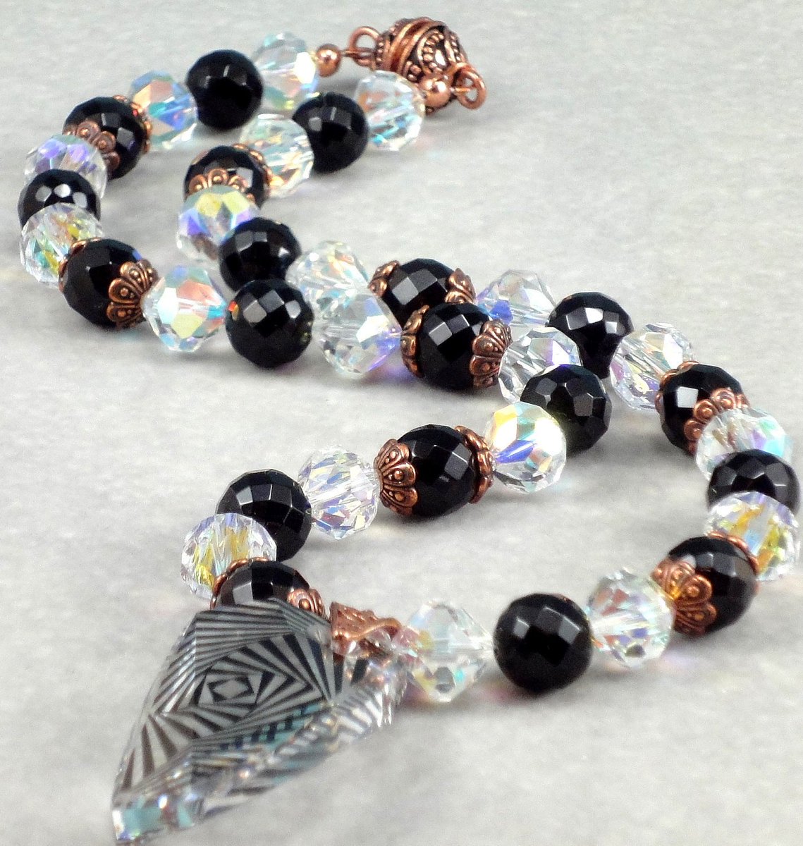 DesignedbyVal's tweet photo. Black Onyx  and Copper Necklace, Statement Necklace https://t.co/XOT3OrcHkR #Jewelryonetsy #ZebraPendant https://t.co/TzxlzLJ8Wa