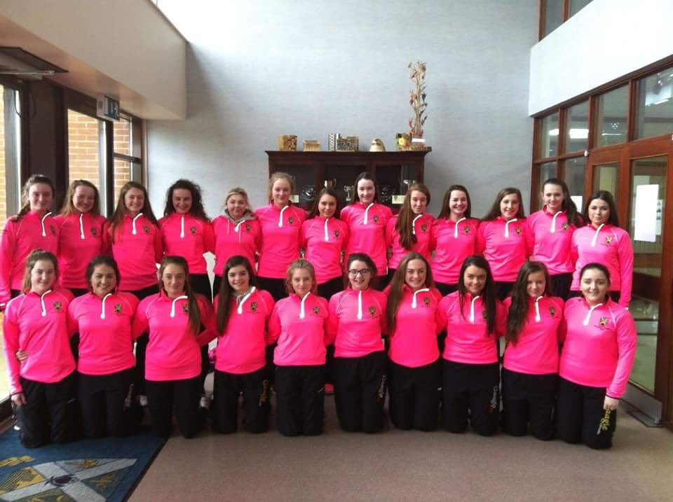 CpcBallycastle's tweet photo. Our camogs pictured this morning in front of the trophy cabinet before they headed off. Can another one be added??? https://t.co/kr9NdALVLH
