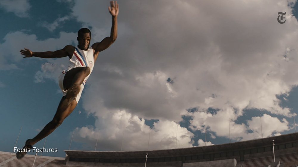 nytimesarts's tweet image. Jesse Owens enters the Olympic stadium, with Hitler watching, in this scene from "Race" nyti.ms/1PU70WG