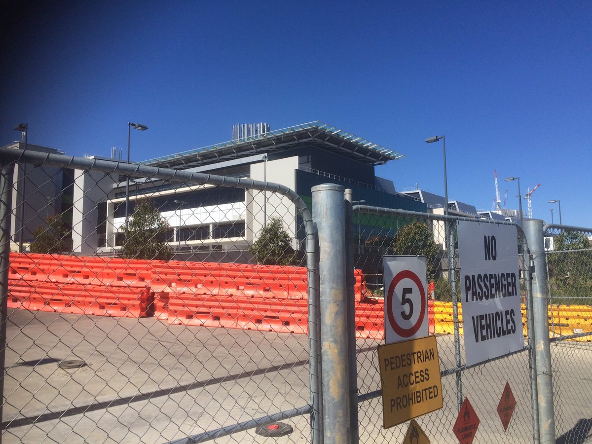ajhegarty9's tweet photo. Workers leaving nRAH. Construction site closed after worker crushed between scissor lift and wall. @TenNewsADEL https://t.co/1C5EGJJcrc