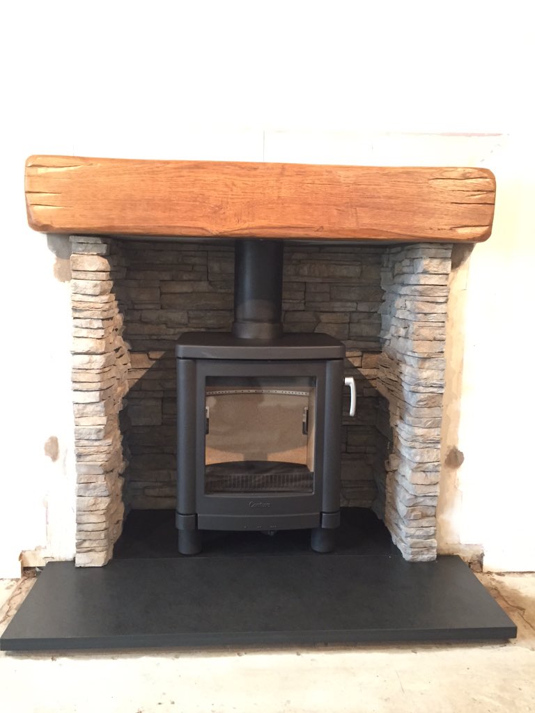 Riven slate hearth Stacked stone chamber oak beam with contura 51L  <a href="/dantonfires/">Danton Fireplaces</a> <a href="/ConturaStoves/">Contura</a> <a href="/ConturaPhil/">Phil Wood</a>
