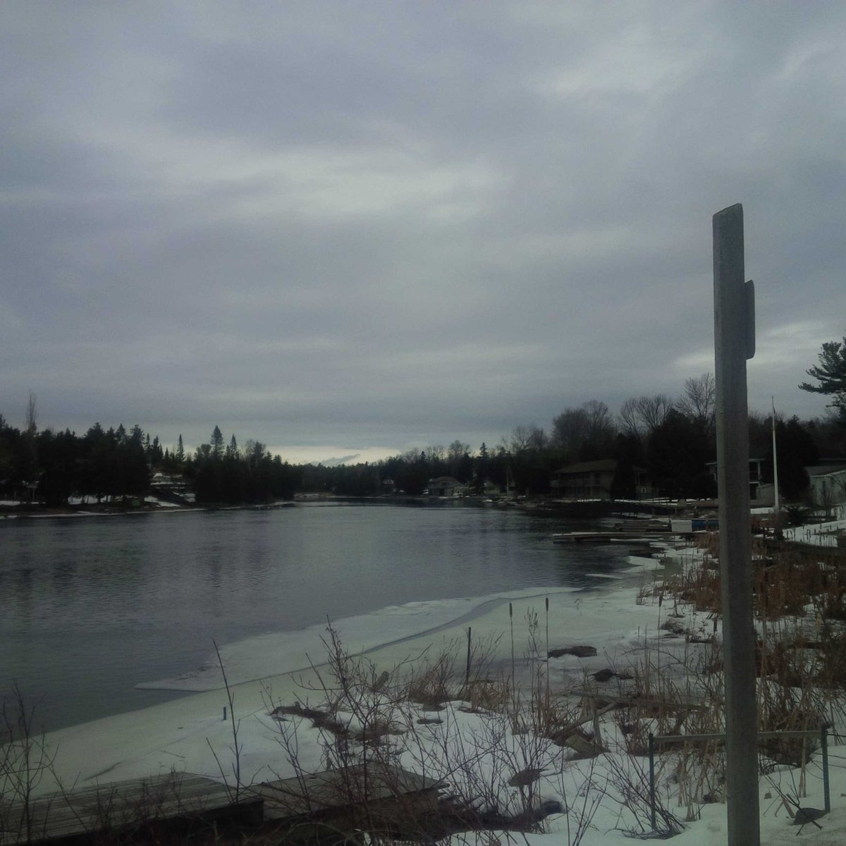 wiggins6_kate's tweet photo. The river at Sauble serene. In the distance the sky looks like ski hill. https://t.co/Iw6DRsqMx8