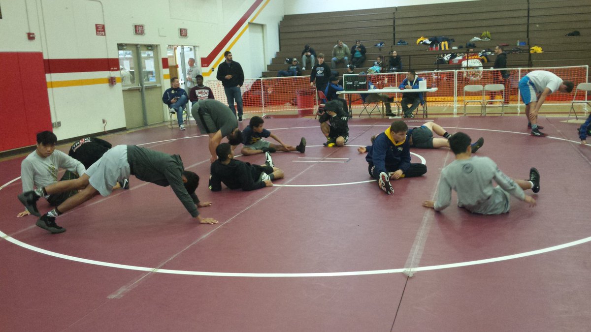 Tiger Wrestlers warming up for day 2 of divisionals. 13 wrestlers competing.