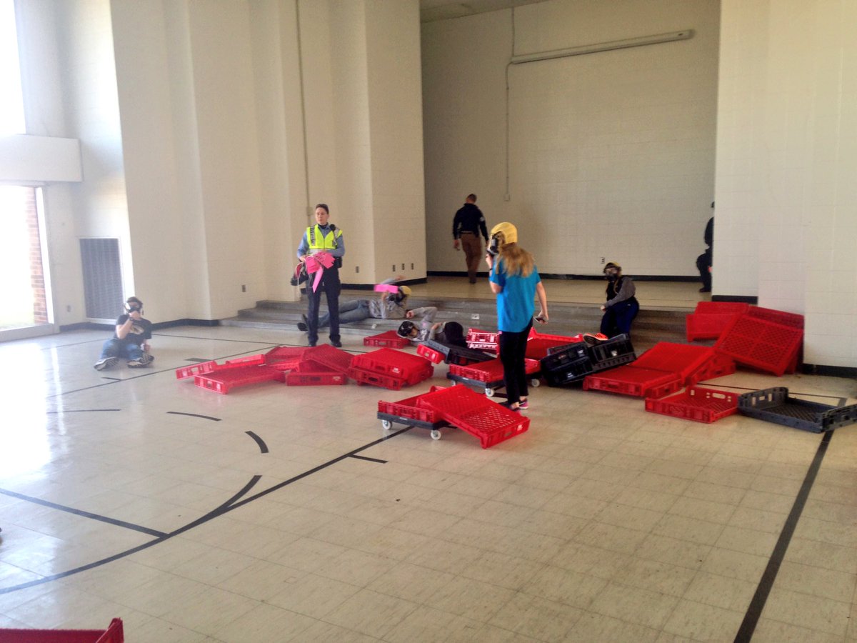 SLMPD's tweet photo. Training in progress at 5701 Wilson. Officers &amp; role players are engaged in a simulated active shooter situation. https://t.co/jQfKh0iwnj