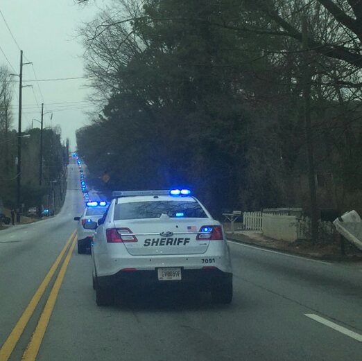 PortiaFOX5's tweet photo. Metro Atl LEOs escort #MajorGregBarney to his final resting place at Forest Lawn cemetery @FOX5Atlanta #RiverdalePD https://t.co/Bg9dlFih7P