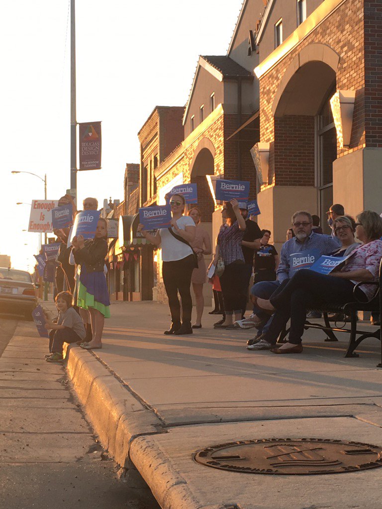 SedgCoforBernie's tweet photo. The sun may be setting, but Wichita is just starting tonight to support the Bern man #ICTBernie https://t.co/LbjD6dNLq6