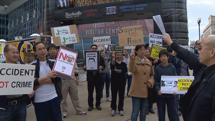 AlexBrownKC's tweet photo. Demonstrators gathered on Broadway in #Nashville to protest the conviction of Peter Liang #Justice4Liang https://t.co/kpmcmhWv5p