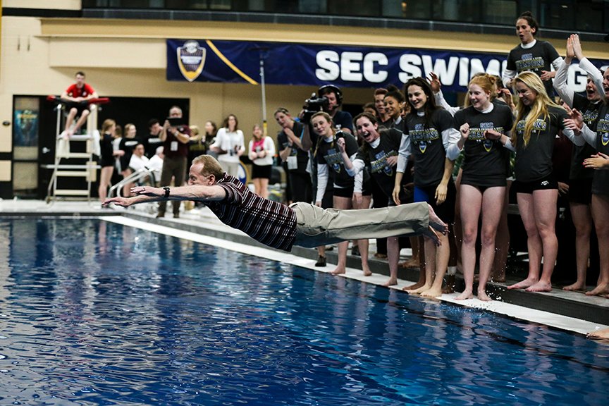 AggieSwimDive's tweet photo. The famous @CoachBultman victory leap!!
#SECSD16 https://t.co/5ZD8dBlnH1