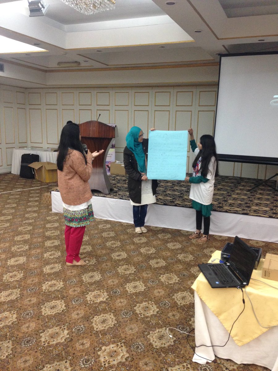 iEARNPAK's tweet photo. Groups presenting their assignments up front. Amazing learning energy in the room. #SIETabLab https://t.co/kf8OlyEBBk