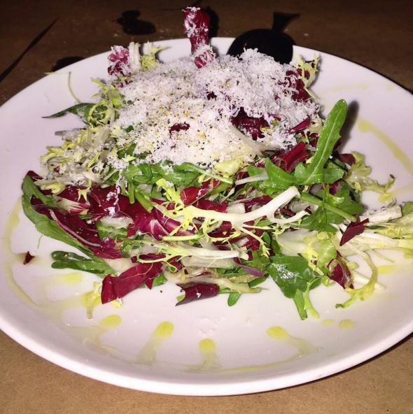 Get your greens fix with the Misticanza Salad, featuring wild arugula and frisèe. (photo via @theforkaddict)