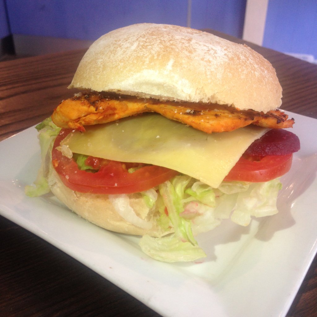thechicknshack's tweet image. With just a little kick, our #PiriPiriChicken Burger is the perfect #ShackRecovery cure!
