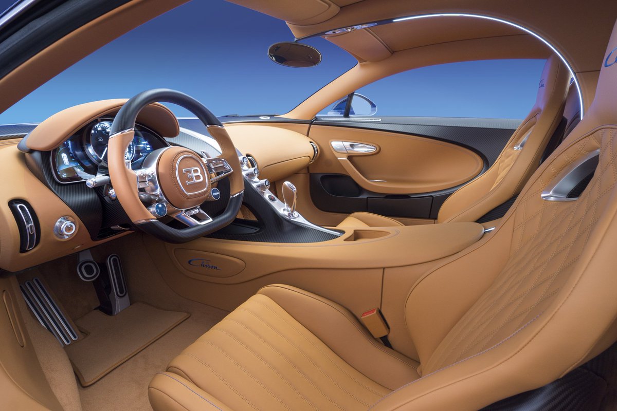 business's tweet photo. Bugatti’s $2.61 million Chiron could be the fastest production car in the world https://t.co/rZRAwINnVi https://t.co/9V1ypP38EG