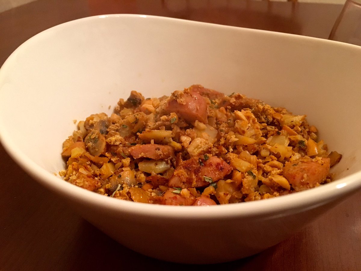 Fitbrook's tweet image. Delicious! Grated cauliflower, mushrooms, chicken sausage, and an egg. Made it spicy! #Paleo