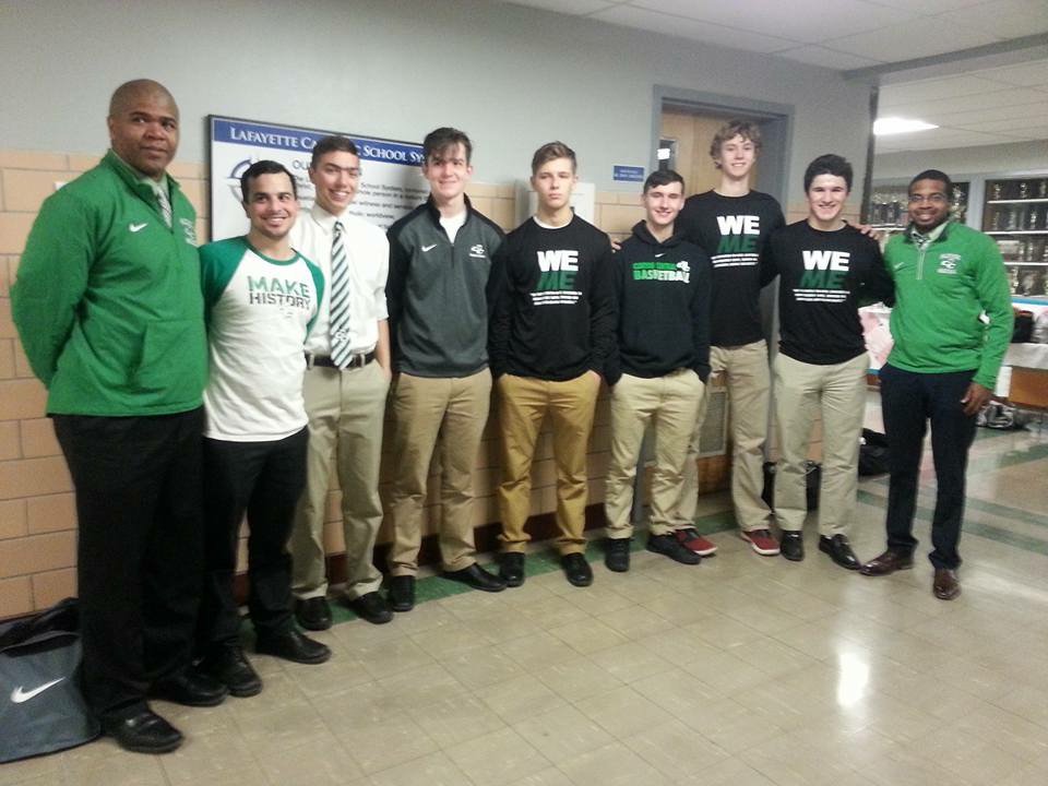 Senior basketball players and the coaches. Great effort tonight and all season!!