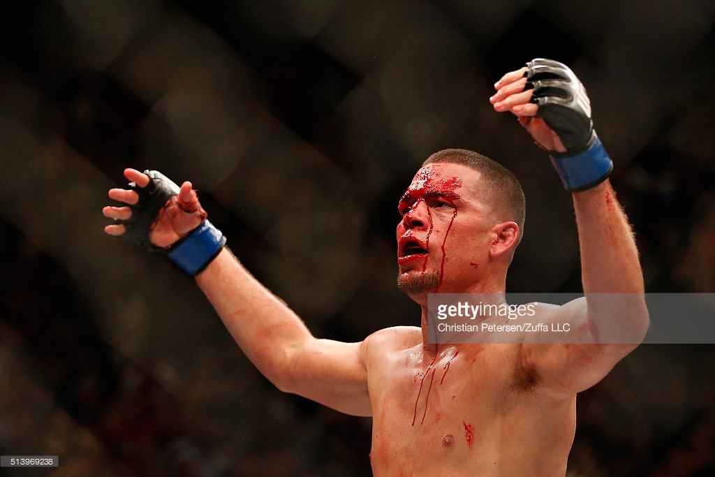 GettySport's tweet photo. The submission and the celebration. #NateDiaz #UFC196 https://t.co/4IsxrU6Ki7