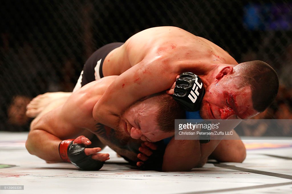 GettySport's tweet photo. The submission and the celebration. #NateDiaz #UFC196 https://t.co/4IsxrU6Ki7