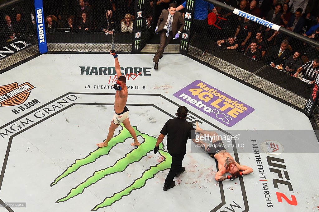 GettySport's tweet photo. The submission and the celebration. #NateDiaz #UFC196 https://t.co/4IsxrU6Ki7
