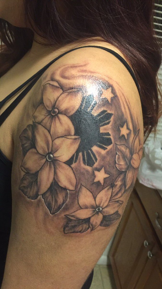 KSlayNoir's tweet photo. So fucking happy. The Filipino national flower the sampaguita and the Filipino sun and stars. #filirican #addingon https://t.co/G19jbjbtcA