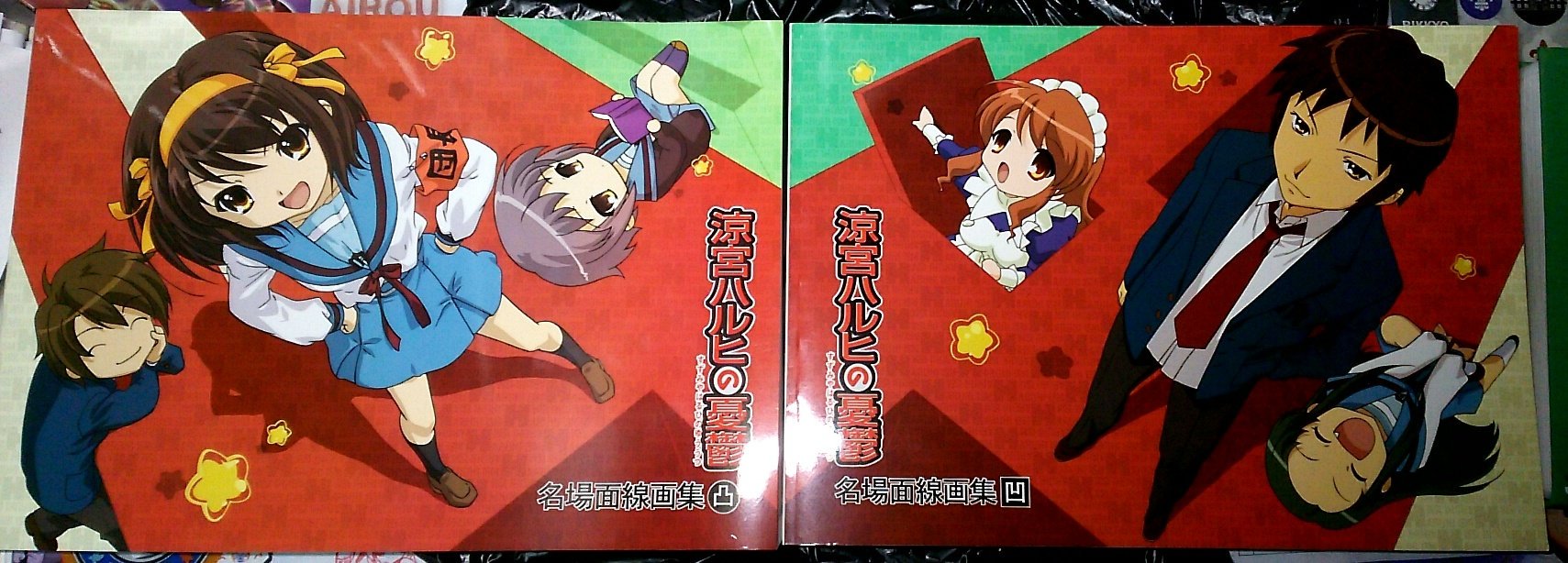 Amazon.co.jp: 涼宮ハルヒの憂鬱 名場面線画集 凸巻 : 本