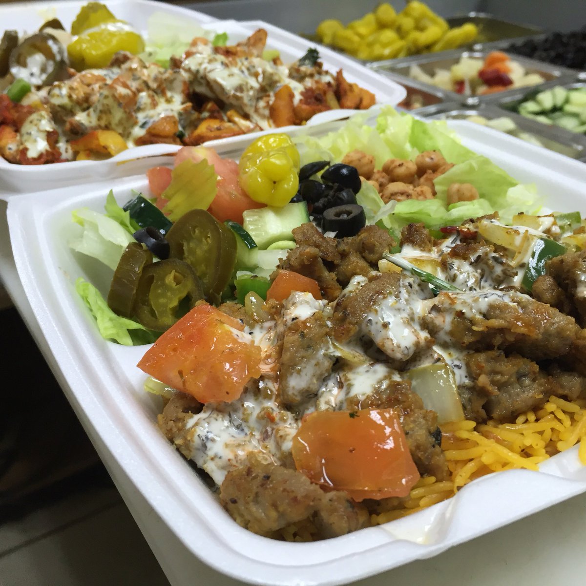 thehalalspot's tweet photo. Lamb #GyroPlatter anyone? Extra white sauce is always a great finish. #halalfood #gyro #foodie #TheHalalSpot https://t.co/zUxdkGu7WW