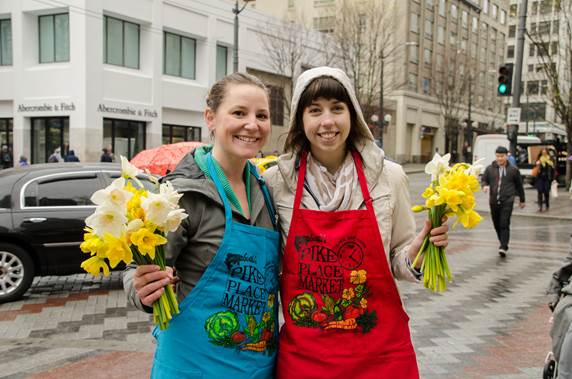 pike_place's tweet photo. You know it's spring when Pike Place Market brightens downtown w/ Daffodil Day on March 18! https://t.co/yqbnwRwr59 https://t.co/XKxyyO4hvI