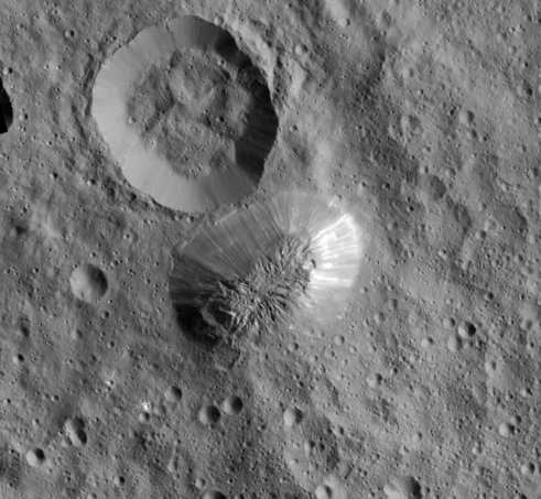 Behold, the mountain Ahuna Mons, a unique treasure of #Ceres. As seen from my lowest orbit: go.nasa.gov/1TZv940
