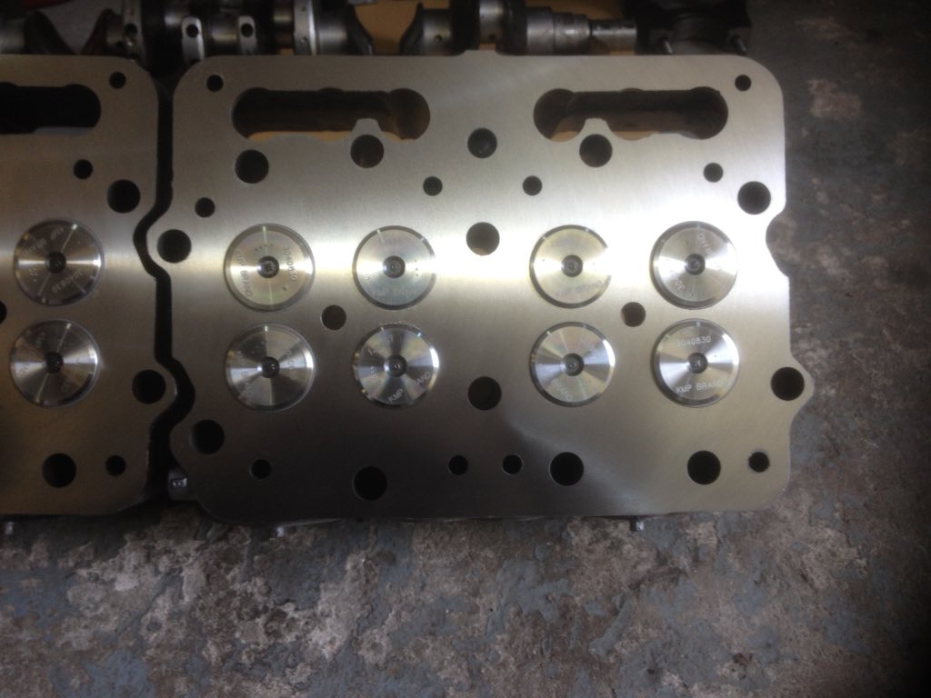 PowermaxEngine's tweet image. Cummings 240 cylinder heads just after bead blast new valve guides valves valve seats recut and resurfaced.