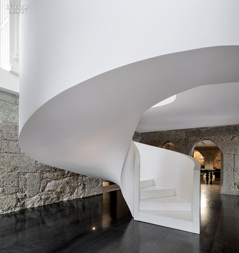 A staircase with Namibian marble steps connects levels in a renovated 18th-century farmhouse bit.ly/1UcBNRJ