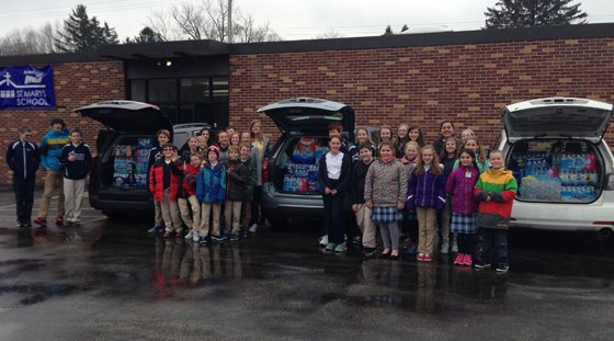 DMTOttawa's tweet photo. St Mary's  joins 3 area schools to collect water for Flint. #DoingMoreTogether https://t.co/4valBwbrtz https://t.co/zU9ZkBbdZg