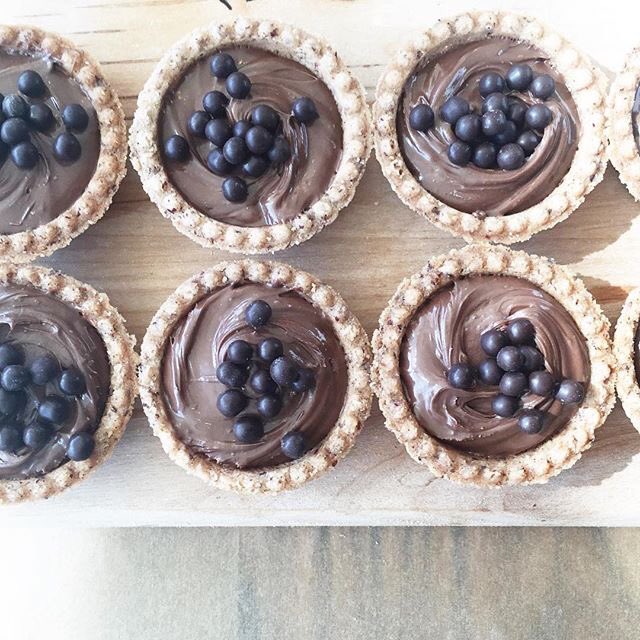 New mini tarts in the bakery. Too cute to eat, but we ate them anyways! 😊😋 #rockenwagner