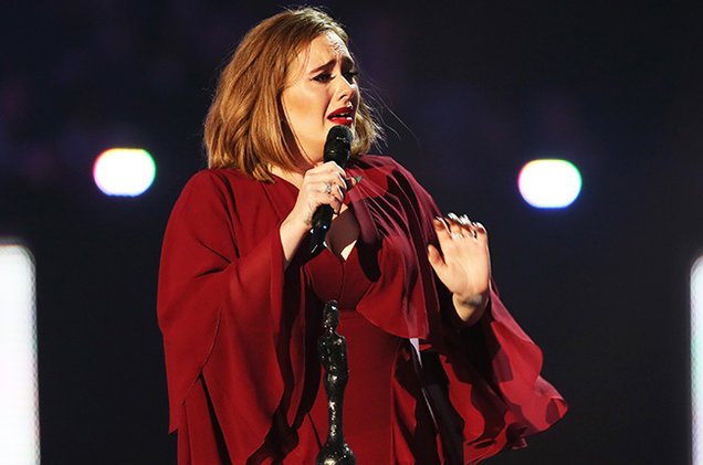 billboard's tweet photo. Adele cries (and curses) after accepting the Global Success Award at #BRITs2016 https://t.co/aLfDe7NJkM https://t.co/26zU2Jtx45