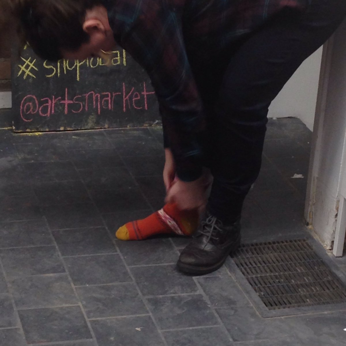 ArtsMarket's tweet photo. Christine could not wait to put on her new socks by @rolakeyonge ! #am2016riverside #790QueenEast #shoplocal https://t.co/Unuckzt4vj