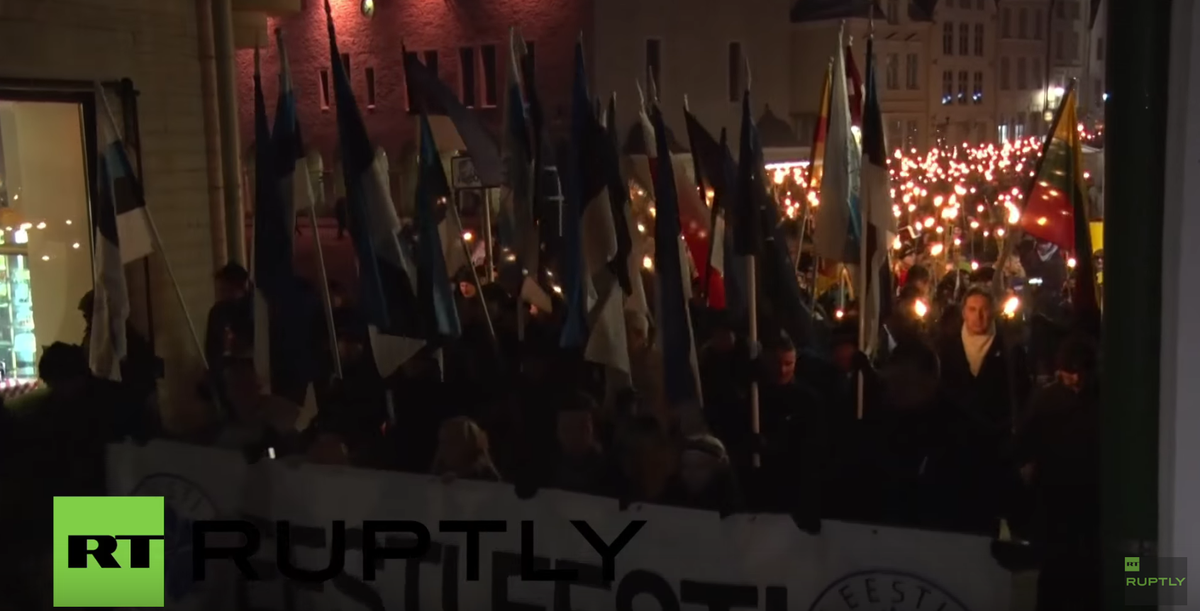 Ruptly's tweet photo. 'Soldiers of Odin' hold torch-lit march on Estonian Independence Day https://t.co/pn53Z9VM1m https://t.co/KHasIfPxYk
