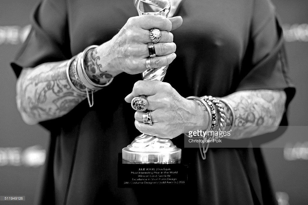 CostumeAwards's tweet photo. What a cool shot of winner #JulieVogel holding her award for #ExcellenceInShortFormDesign for @DosEquis #CDGA18 https://t.co/uuoyU9W9sR
