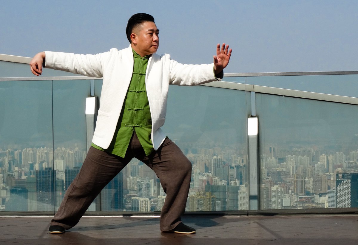 Gina_Samarotto's tweet photo. Chinese Taichi with Master Fu overlooking the city of Shanghai? #Priceless. An exquisite #rcmemory. #LuxuryTravel https://t.co/38Lm8NgBYt