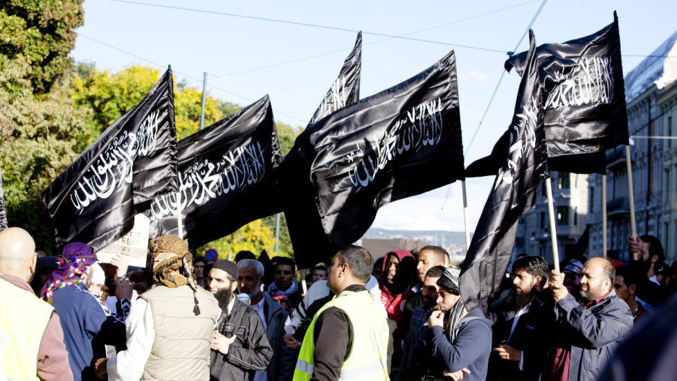MangyMouseX's tweet photo. "Soldiers of Allah" will patrol #Oslo, #Norway with #ISIS-flags.

Just what we need, more shariah police.. #Islam https://t.co/LJnsblLxQP