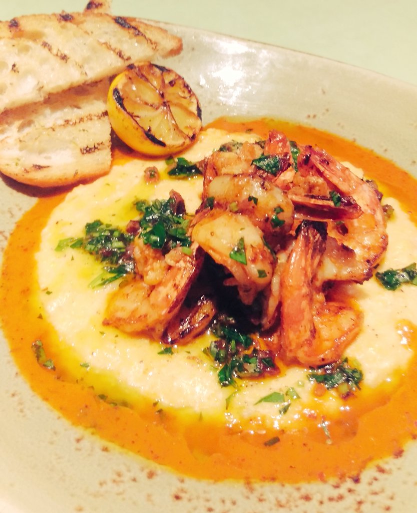 #tgirvine dinner special - Cajun Grilled Shrimp, bacon &amp; cheddar grits, grilled Meyer lemon, Bacon Gremolata
