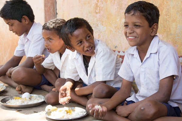 #TBT to these big smiles of children in #India eating fortified food as part of the #SchoolMeals programme